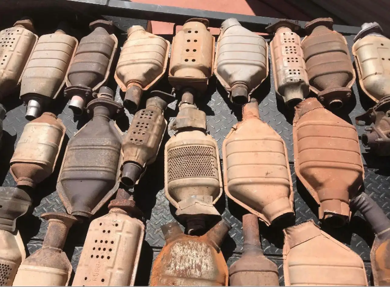 Used catalytic converters collected for metal recycling and recovery.
